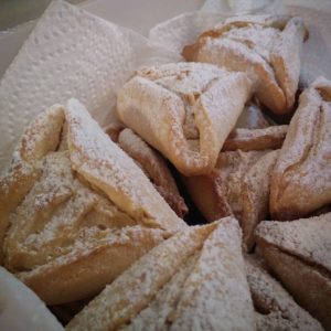 A close up of some pastries on a paper towel