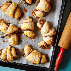 A baking sheet with some pastries on it