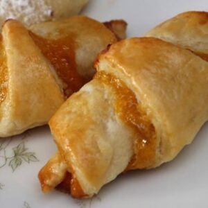 A close up of some pastries on a plate