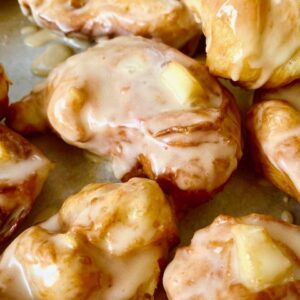 A close up of some pastries covered in icing.