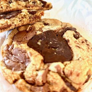 A cookie with chocolate on top of it.